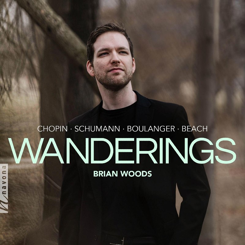 Cover art for an album showing a man dressed all in black standing in a forest, with the text "Wandering, Brian Woods, Chopin, Schumann, Boulanger, Beach" overlaid